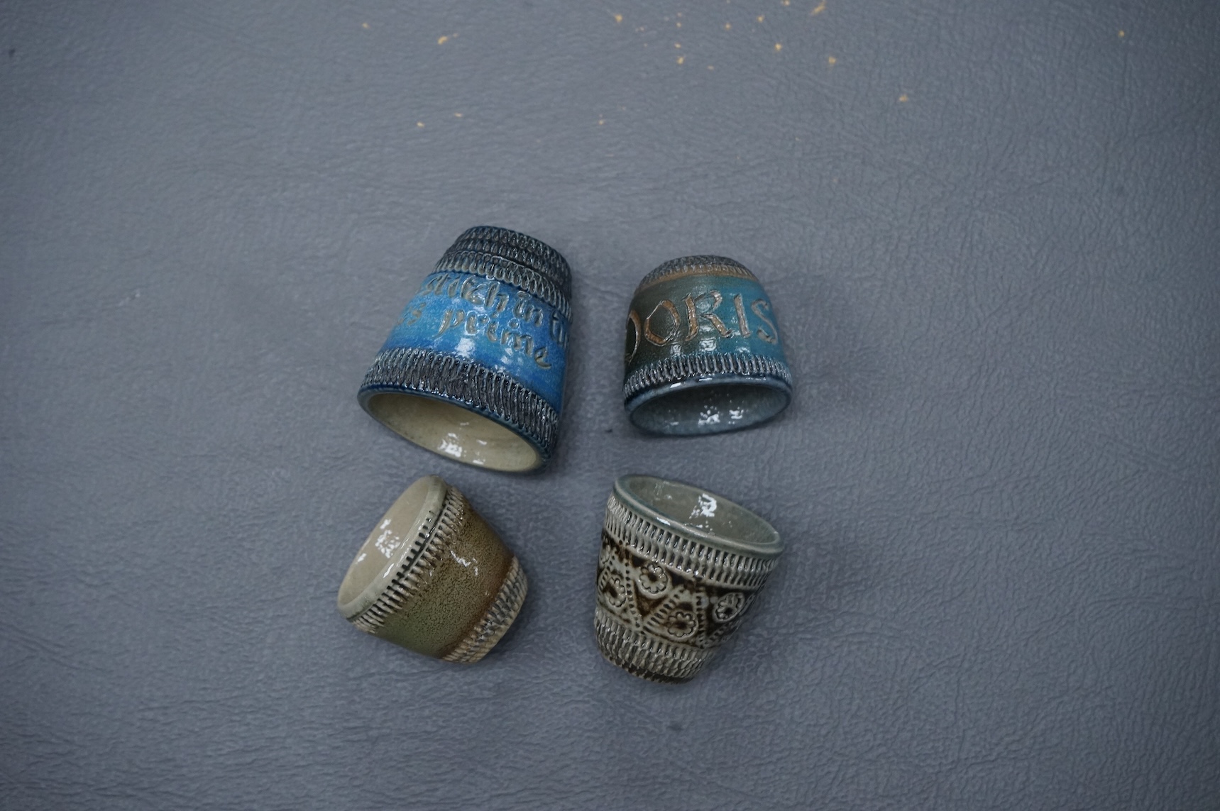 Guy Sydenham (1916-2005), four thimbles, made for the potter’s sister-in-law Doris, tallest 3cm